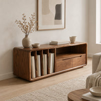 Low tv stand with vertical slots, an open shelf and two drawers in a Scandinavian living room with white walls