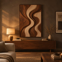 Wall art panel with flowing wave bands in dark and pale wood above a low console in an evening living room