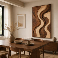 Wall art panel with flowing wave bands in dark and pale wood beside a dining table in natural light