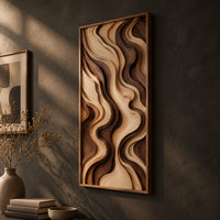 Tall framed wall art with layered wave relief in light and dark wood, three-quarter view showing the carved depth
