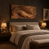 Carved wood wall art panel with a large feather in deep relief above a bed in a dusk lit bedroom