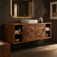 Corner detail of wall mounted bathroom vanity with carved wave panels and open end shelves beside wood, brass and linen samples