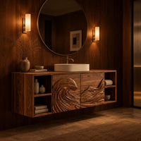 Wall mounted bathroom vanity with carved wave panels and open end shelves in an evening bathroom with walnut wall paneling