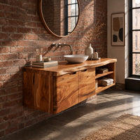 Wall mounted bathroom vanity with a live edge top and an open shelf in an industrial loft bathroom with exposed brick