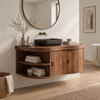 Wall mounted bathroom vanity with a wavy front, two doors and open shelves in a Scandinavian bathroom with white walls