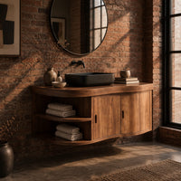 Wall mounted bathroom vanity with a wavy front, two doors and open shelves in an industrial loft bathroom with exposed brick