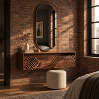 Floating makeup vanity with an open top niche and a wave carved front in an industrial loft bedroom with exposed brick