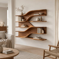 Wall mounted wooden shelves with flowing wave tiers and a curved backboard in a Scandinavian living room with white walls