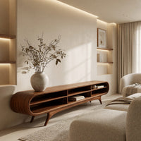 Warm grain capsule TV cabinet on splayed legs in an open plan space in daylight