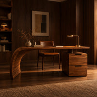 Desk with a sweeping waterfall leg and a two drawer pedestal in an evening home office with walnut wall paneling