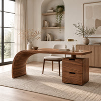 Desk with a sweeping waterfall leg and a two drawer pedestal in a Scandinavian home office with white walls