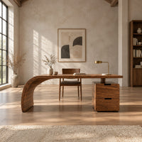 Desk with a sweeping waterfall leg and a two drawer pedestal in a bright open plan home office