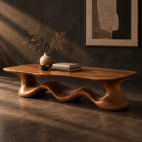 Coffee table with a freeform slab top on a rolling wave shaped base, three-quarter view showing the grain