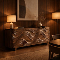 Sideboard with wave carved door fronts and short feet in an evening dining room with walnut wall paneling