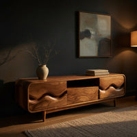 Mid century TV cabinet with wave carved doors in a living room at golden hour