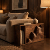 End table with a carved wave front and an open side compartment in an evening living room with walnut wall paneling
