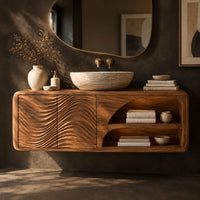 Corner detail of floating bathroom vanity with wave carved doors and an open shelf bay beside wood, brass and linen samples