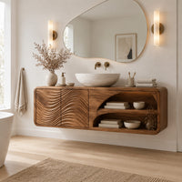 Floating bathroom vanity with wave carved doors and an open shelf bay in a Scandinavian bathroom with white walls