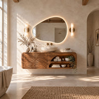 Floating bathroom vanity with wave carved doors and an open shelf bay in a bright open plan bathroom