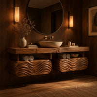 Floating vanity with a thick slab top over two wave carved pods in an evening bathroom with walnut wall paneling