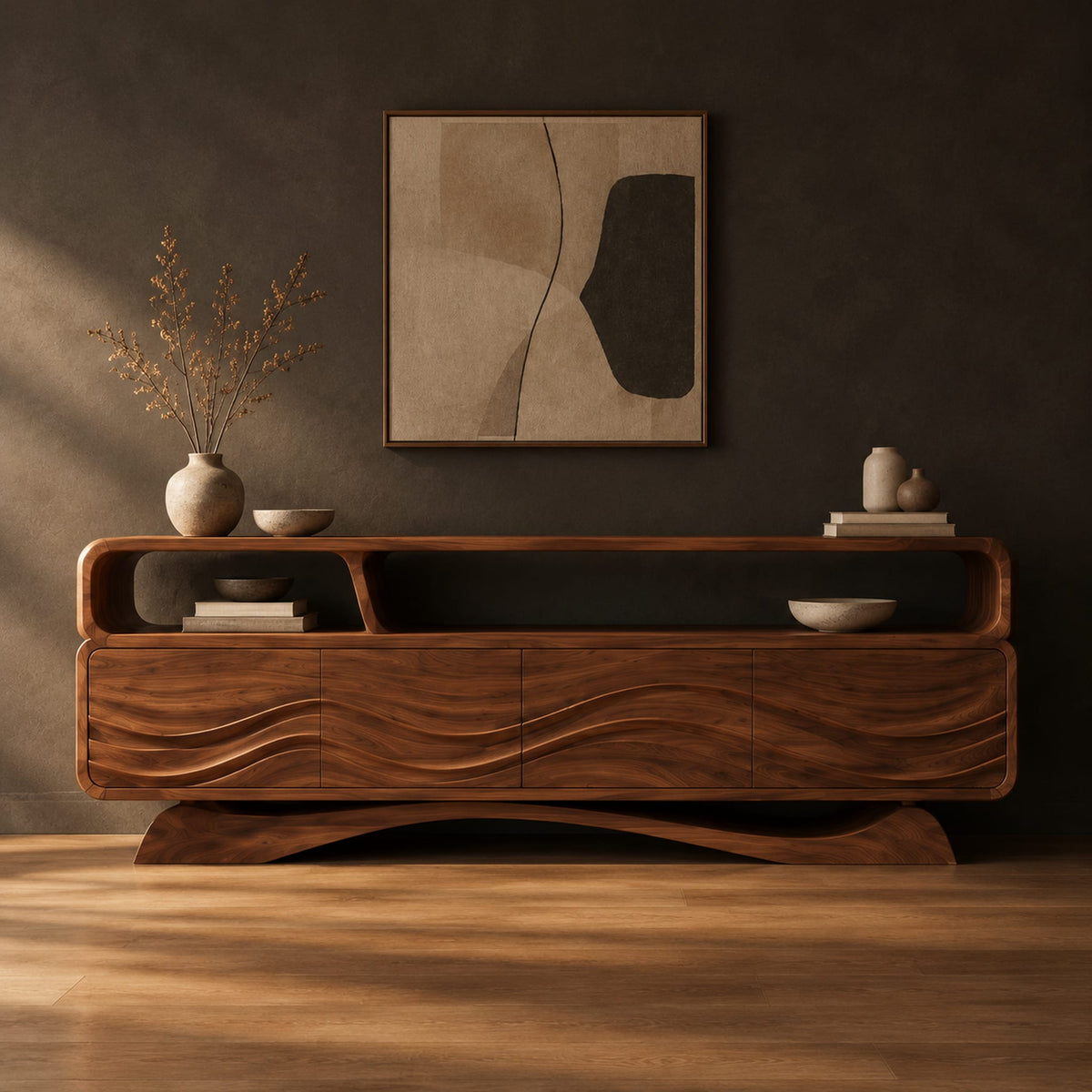 Tv stand with wave carved panels, an open top shelf and an arched base in a dark studio against a charcoal plaster wall