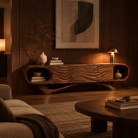 Wooden tv stand with oval end niches, wave carved panels and a swept base in an evening living room with walnut wall paneling