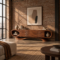 Wooden tv stand with oval end niches, wave carved panels and a swept base in an industrial loft living room with exposed brick