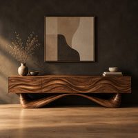 Tv stand with a wave carved cabinet on a sweeping sculpted base in a dark studio against a charcoal plaster wall