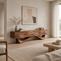 Tv stand with a wave carved cabinet on a sweeping sculpted base in a Scandinavian living room with white walls