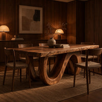 Dining table with a live edge top and a looping wave base in an evening dining room with walnut wall paneling
