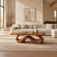 Rectangle coffee table with softly shaped corners on a flowing wave loop base in a bright open plan living room