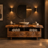 Bathroom vanity with wave carved fronts and a live edge top in a dark bathroom at golden hour