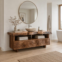 Bathroom vanity with wave carved fronts and a live edge top in a Scandinavian bathroom with white walls