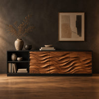 Sideboard with wave relief wood panels, a black frame and open shelves in a dark studio against a charcoal plaster wall