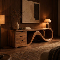Tv stand with a three drawer block and a flowing wave ribbon in an evening living room with walnut wall paneling