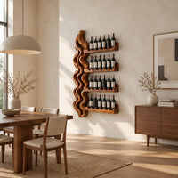Wine rack with a tall wavy backbone and four notched shelf arms in a bright open plan dining room