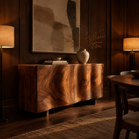 Wavy edged sideboard with two front panels and bold wood grain in an evening dining room with walnut wall paneling