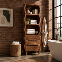 Tall bathroom cabinet with three wavy open shelves and three drawers in an industrial loft bathroom with exposed brick
