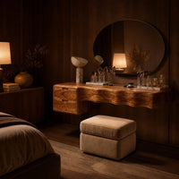 Floating wood makeup vanity with a wavy carved front and two small drawers in an evening bedroom with walnut wall paneling