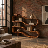 Wavy ribbon bookshelf with open shelves joined by chunky square posts in an industrial loft living room with exposed brick