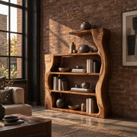 Bookshelf with wavy wood sides, open shelves and a top ledge in an industrial loft living room with exposed brick
