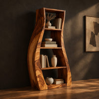 Tall bookshelf with wavy side panels and open shelves, three-quarter view showing the grain