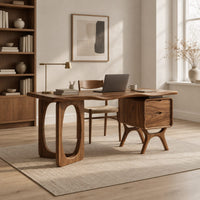 Wooden desk with an oval leg frame, a wavy top and a side pedestal in a Scandinavian home office with white walls
