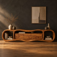 Wavy tv stand with open oval end bays and a three panel center in a dark studio against a charcoal plaster wall