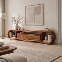 Wavy tv stand with open oval end bays and a three panel center in a Scandinavian living room with white walls