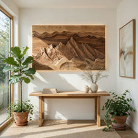 Wide landscape wall relief with layered sky bands in a bright sunroom with green plants