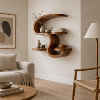 Sculpted wall shelf in an s shape with a hooked top and small ledges in a Scandinavian living room with white walls