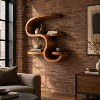 Sculpted wall shelf in an s shape with a hooked top and small ledges in an industrial loft living room with exposed brick