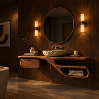 Floating bathroom vanity with a long slab top, drawer pod and open loop niche in an evening bathroom with walnut wall paneling