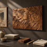 Detail of large rectangle wooden wall panel carved with deep flowing windswept strands beside wood, brass and linen samples